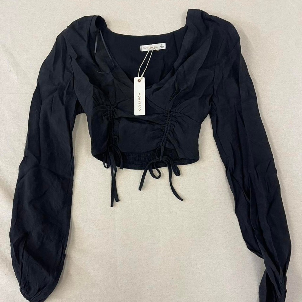 Black ruched crop top with puff sleeves